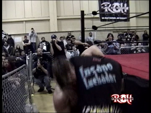 I'd make a joke about Super Crazy still wearing one of his ECW shirts if the whole crowd wasn't doing the same.
